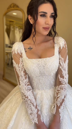 G21-104A robe de mariée princesse en dentelle perlée ivoire